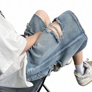 Jeans courts déchirés pour hommes 2024 Summer New Fi Casual Loose Big Hole Style rétro Denim Shorts Homme Marque Vêtements Pantalons B51 H1HL #