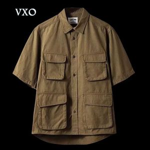 Chemises masculines 5/4 Shirt Work Shirt American Style Elastic Goods Short Retro Outdoor Multi Pocket Shirt Four Shirt Pocket Taille asiatique YQ240422