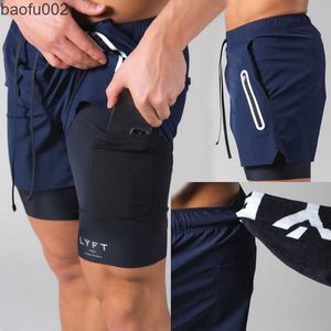 Shorts pour hommes 2021 mode tendance pantalons de sport mâle Muscle Fitness marée Double couche Shorts été course entraînement respirant Stretch décontracté W0327