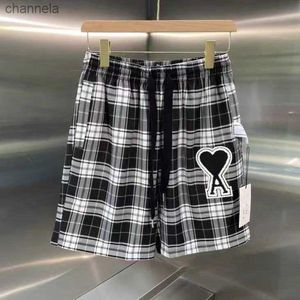 Shorts pour hommes 2022 Début du printemps New Peach Heart A Love Plaid Shorts de sport décontractés pour hommes et femmes Pantalons à jambe droite polyvalents 5/4