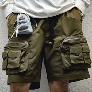 Shorts pour hommes 2023 nouveau pantalon cargo d'été hommes tendance vert olive 3d pantalon américain multi poche short de travail streetwear y2k pantalons de survêtement J240120