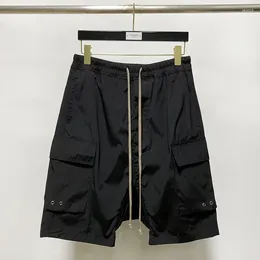 Shorts pour hommes 2023 été plusieurs poches Patchwork Cargo Hihg Street Harajuku Streetwear pantalon noir homme Techwear