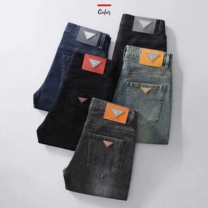 Heren shorts 2024 Leer- en herfst nieuwe licht luxe hoogwaardige jeans heren recht op rechte pijp slanke zakelijke heren casual broek j240507
