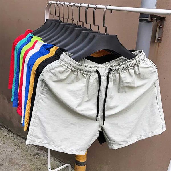 Shorts masculins 2024 Summer Running Trawstring Elastic Wair Loose Gym Sports Mens Casual Jogging Q240427