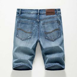Shorts masculins 2024 shorts d'été pantalon de denim pour hommes élastiques en bleu profond design de mode masculine