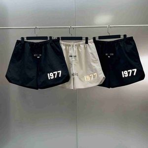 Shorts pour hommes 22 Impression réfléchissante 1977 Nylon tissé Casual Capris Sports High Street Hip Hop Apparelyolq