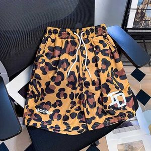 Heren shorts American Trendy High Street Leopard Print Shorts For Boys Loose Casual Summer Nieuwe Sports Quick Drying Ademende basketbalbroek J240409