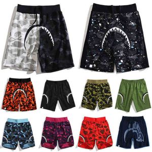 Shorts pour hommes Shorts de plage Pantalons de sport pour hommes Pantalons de survêtement pour femmes Pantalon de survêtement d'été Camouflage Pantalon court Lettre de mode Impression Tête de requin lumineuse