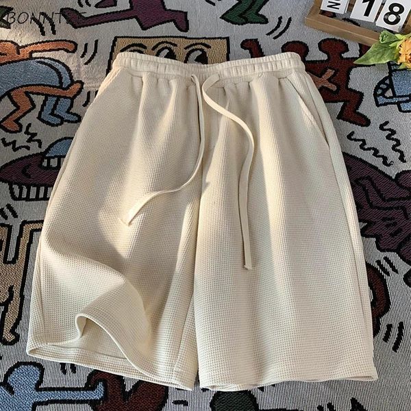 Pantalones cortos para hombres Casual Hombres Verano Guapo Moda Longitud de la rodilla Pantalones deportivos sueltos Todo fósforo Bolsillo sólido Cordón Outwear High Street