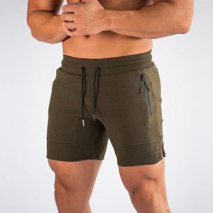 Shorts pour hommes Chic Hommes Absorption de la sueur Sport Poches zippées Exercice Beachwear Couleur unie Plage