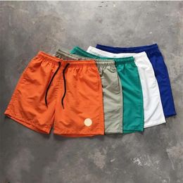 Pantalones cortos para hombres Diseñador Marca francesa Lujo para hombres Deportes cortos Verano Tendencia para mujeres Puro Transpirable Pantalones cortos de natación Pantalones de playa Pantalones calientes Ropa 9bt9