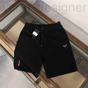 Shorts pour hommes Designer version haute P famille printemps / été bande de caoutchouc de compression pantalon moyen décontracté à cinq points, short avec logo triangle en métal latéral pour hommes HVW8