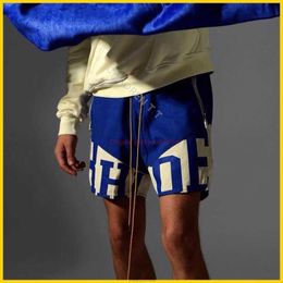 Pantalones cortos para hombres Diseñador Ropa de moda corta Pantalones cortos de playa Rhude 2xs Panel de letras americanas Pantalones de chándal con cordón de verano High Street Capris Trend Joggers Sport