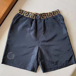 Shorts masculins Designer shorts décontractés surdimensions d'été Nouveau short de marque à la mode pour hommes trimestres pantalons plage pantalon de soie glace pantalon masculin