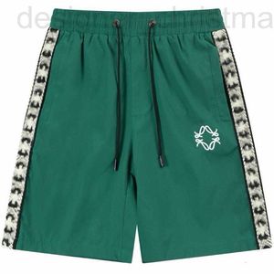 Diseñador de pantalones cortos para hombres Summer Casual Loose Shorts versátiles versátiles de pantalones divididos elásticos cómodos y transpirables wsjj