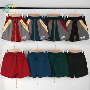 Heren shorts borduurwerk splice mannen vrouwen 1 1 groen rood grijze kleur bijpassende patchwork -rijbroek in mesh met tags y2302