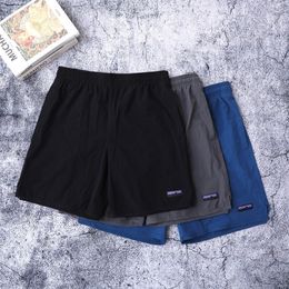 Hommes Shorts Marque De Mode Casual Hommes Femmes Séchage Rapide Multi Poche Cargo Vintage Taille Élastique Lâche Genou Longueur Pantalon Mâle 230731