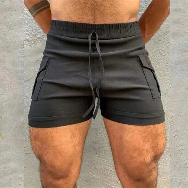 Pantalones cortos para hombres Moda Bolsillos de parche Hombres delgados Verano Casual Color sólido Cintura elástica Cordón Pantalón corto Deportes Fitness para hombre
