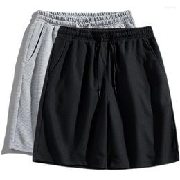 Herenshorts HCXY-merk heren zomersport elastische effen kleur mannelijke losse all-match vijfpuntsbroek voor heren