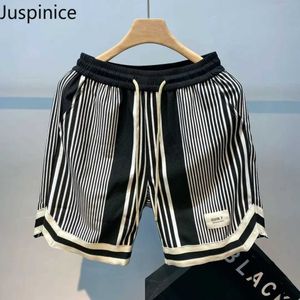 Heren shorts shorts Japanse stijl Vergelijking Casual shorts Heren Summer Striped Loose Sports Beach Five Point Mens Underwear Mens Sports Shirt J240407