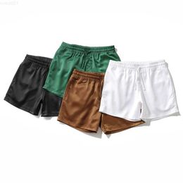 Shorts pour hommes Shorts de sommeil décontractés pour hommes Blanc Pyjama soyeux Shorts Drstring Pockets Homme Satin Homewear Lounge Beach Boxershorts Homme L230719