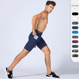 Pantalones cortos para hombres Pro Fitness Bolsillo Deportes Correr Entrenamiento Sudor Wicking Secado rápido Elástico Apretado