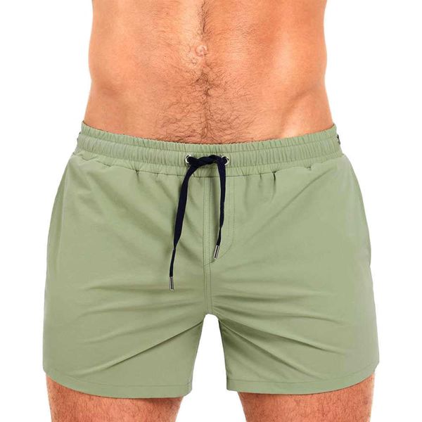 Shorts pour hommes Maillots de bain courts serrés pour hommes maillots de bain maillots de bain solides à séchage rapide pantalons de plage maillots de bain avec poches et doublure en maille Z0504