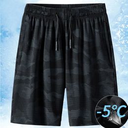 Pantalones cortos para hombres Pantalones cortos para hombres Malla de seda de hielo Elástico Verano Camuflaje transpirable Pantalones de secado rápido Pantalones cortos sueltos y delgados Deportes de playa 6XL Pantalones cortos 230424