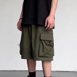 Shorts pour hommes hommes été Cargo plusieurs poches cordon de serrage lâche taille élastique droite couleur unie Hip Hop