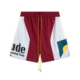 Shorts pour hommes Hommes Designer Short de bain Short Homme Designer Rhude Summer Fashion Pantalons de plage de haute qualité Streetwear Rouge Bleu Noir Violet p JS