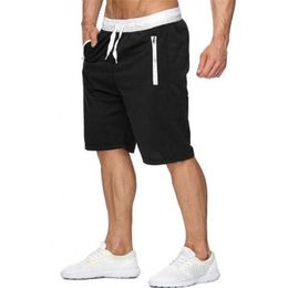 Shorts pour hommes pour hommes Sports Pocket Solid Trawstring Board Dry Beach Shorts Summer Summer Pocket Pockred Pantalon Sports Pantalon J240522