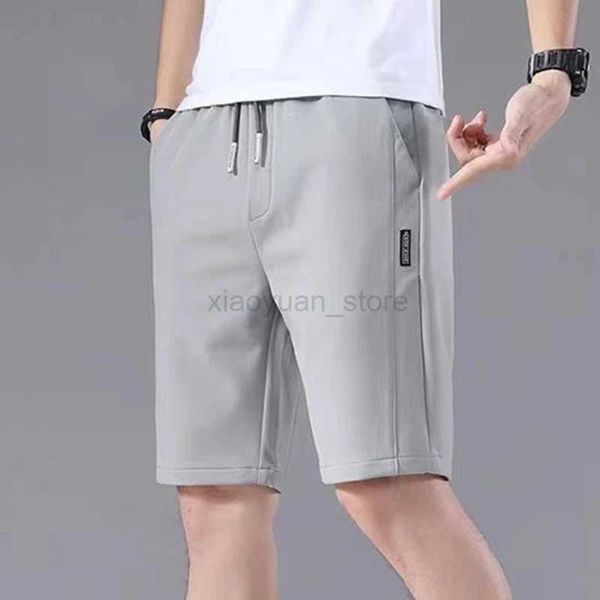 Short masculin pour hommes Sports Shorts de couleur solide Modèle droit de type élastique de type élastique d'été