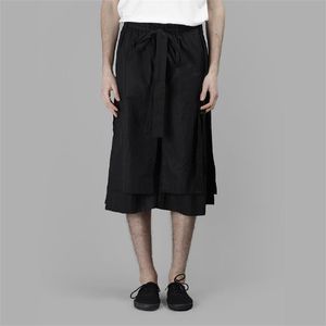 Pantalones cortos para hombres Streamer multicapa Diseño de nicho irregular Falda Dobladillo Encaje japonés Lazo de siete puntos Pantalones anchos