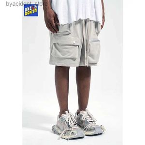 Shorts pour hommes Pantalons courts multi-poches Shorts de basket-ball pour hommes Shorts Baggy avec cordon de serrage High Street Techwear Shorts hommes pantalons de survêtement en coton L240320