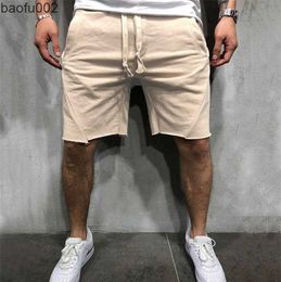 Shorts pour hommes Nouvelle Mode Hommes Sport Beaching Shorts Pantalons Bodybuilding Pantalons De Survêtement Fitness Court Jogger Casual Gymnases Hommes Shorts W0327