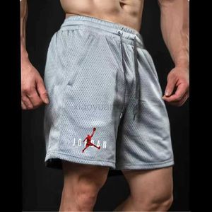Heren shorts Nieuwe modieuze heren Sport Running Fitness Outdoor Wear Losse strand Casual Shorts Polyester Multi-colour Home 240419 240419