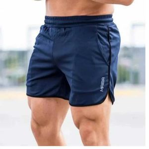 Shorts masculins Nouveaux shorts sportifs respirants coulissants coulant les séchoirs rapides Summer Ultra Thin Train Season Pants 2024 J0426