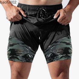 Shorts pour hommes Nouveaux Shorts pour hommes Summer Running Sport Short Verano Hombre Hommes Gym Workout Haute Qualité Nylon Double Couche Camouflage Shorts W0327