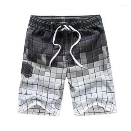 Pantalones cortos para hombres Impresión a cuadros Playa Hombres Streetwear Vacaciones Surf Pantalones Elásticos Cintura Corta Al aire libre Suelto