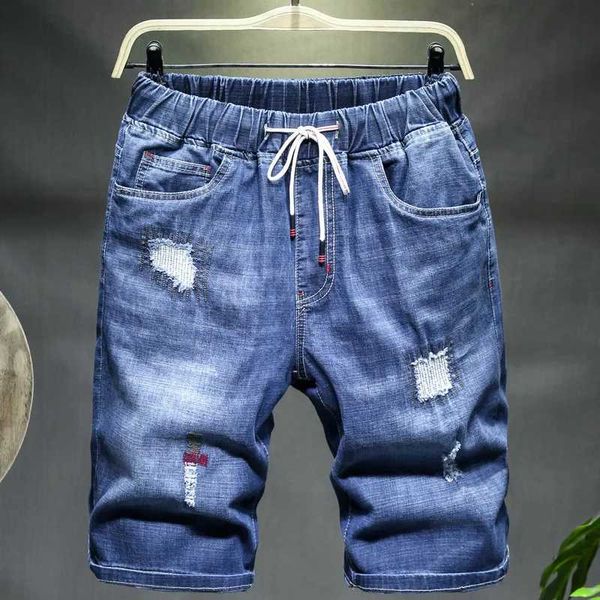 Pantalones cortos para hombres size plus 9xl 10xl de mezclilla suelta de verano pantanes de verano con alta elasticidad talla grande 48 50 52 Jeans negros azules J240407
