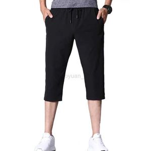 Heren shorts plus size heren casual shorts mode solide kleur stretchy mannelijke broek trekstring zakken snel droge sport bijgesneden broek 240419 240419