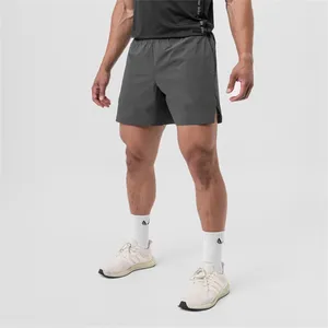 Shorts pour hommes Sports à séchage rapide pour hommes et femmes Entraînement élastique Running Fitness Fitness Pantalon de trois quarts American Summer