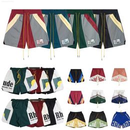 Pantalones cortos para hombre Pantalones cortos de diseñador Rhude para hombre Pantalones de playa de moda Deportes Fitness Pantalones cortos de alta calidad de lujo Verano Casual Versátil Secado rápido Pantalones de malla transpirable HDM