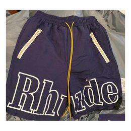 Shorts pour hommes Rhude Designers Mens Basketball Short Pants 2023 Luxurys Summer Beach Palm Letter Street Fashion Pantalons de survêtement Drop Delive Otqph