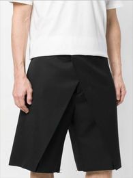 Pantalones cortos para hombres Primavera y verano Personalidad de los hombres Paño de pasta Empalme cruzado Moda Irregular Color puro Pantalones cortos rectos sueltosHombres