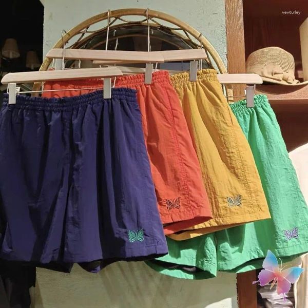 Pantalones cortos para hombres Stock Multi Color Agujas Casual Nylon Malla Transpirable Pantalones de secado rápido Bordado Mariposa Playa Hombres Mujeres