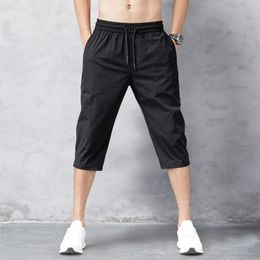 Shorts pour hommes Summer Breeches Thin Nylon 3/4 Longueur Pantalon Mâle Bermuda Board Séchage rapide Plage Noir Long Shorts 210316