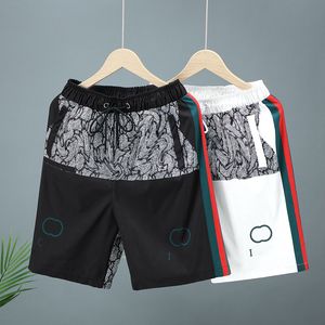 Shorts masculins de mode d'été designer des sports minces décontractés séchage rapides à cinq quarts de pantalon usure plage de la plage