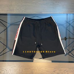 Shorts pour hommes Shorts décontractés à rayures latérales pour hommes d'été de qualité supérieure 100 pantalons de jogging de sport en coton pour hommes et femmes 2023 230731