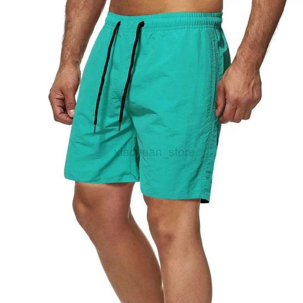 Short masculin Summer shorts hommes couleurs solides séchage rapides plus taille largeur large cordon de jambe de fitness shorts décontractés streetwear 240419 240419